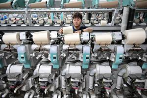CHINA-SHANDONG-QINGDAO-INDUSTRIA TEXTIL-DESARROLLO