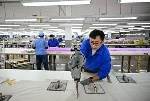 CHINA-SHANDONG-QINGDAO-INDUSTRIA TEXTIL-DESARROLLO
