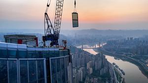 CHINA-CHONGQING-CENTRO INTERNACIONAL TIERRA-MAR-MURO CORTINA DE FACHADA-TERMINACION